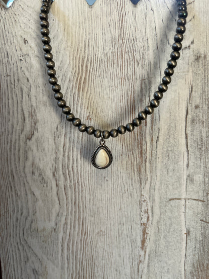 Beaded Necklace with Oval Pendant